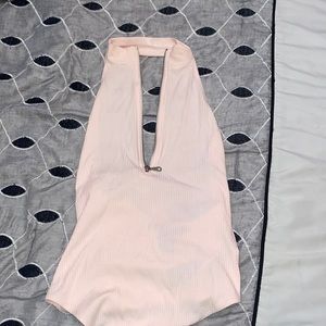 Low back, light pink halter top body suit